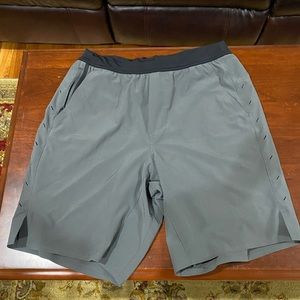 Ten Thousand gray the interval short lined with 9” inseam.